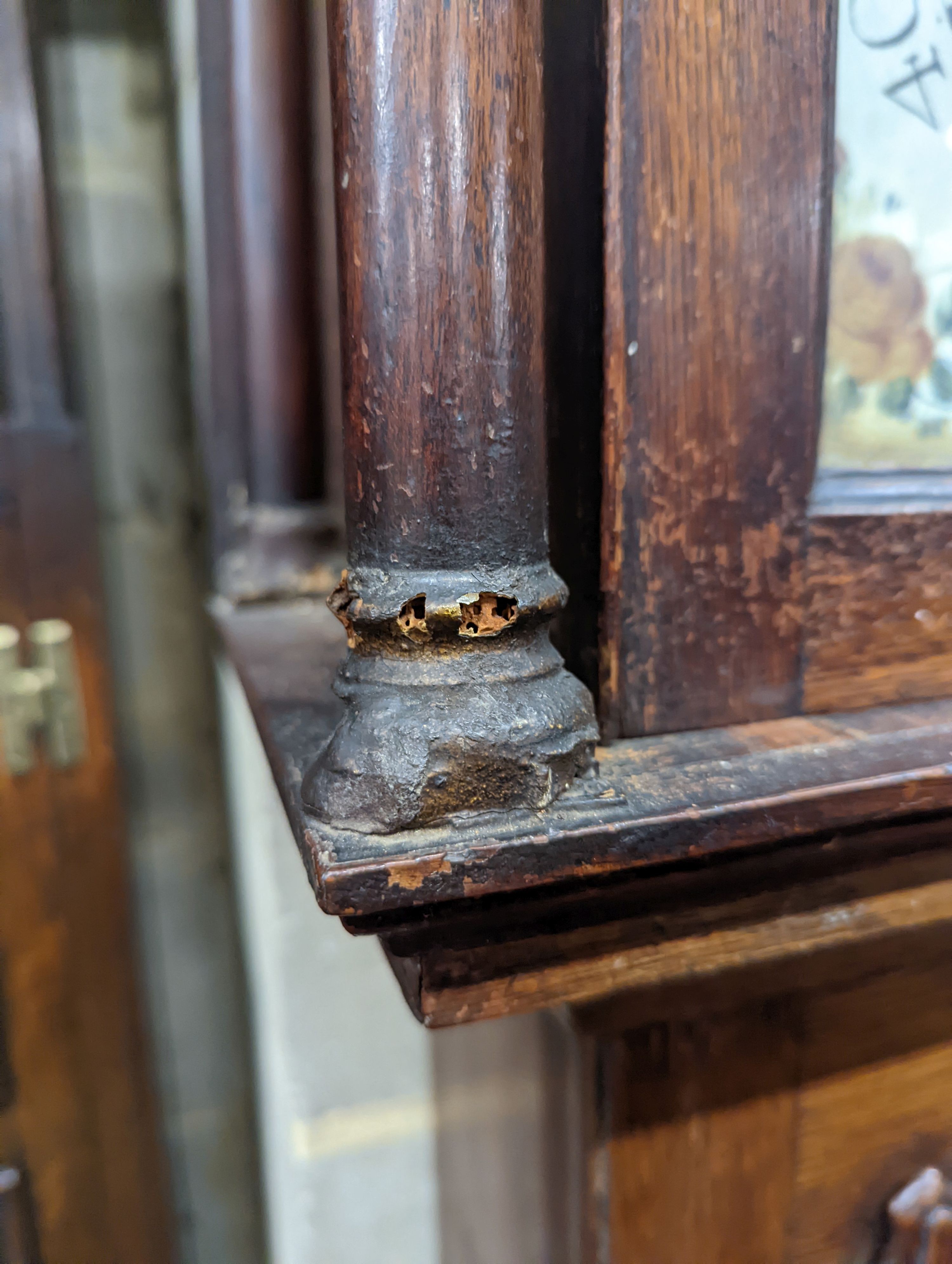 An early 19th century oak eight day longcase clock, the painted dial marked Henry Bunyan, Lincoln, (case in two sections) height 224cm